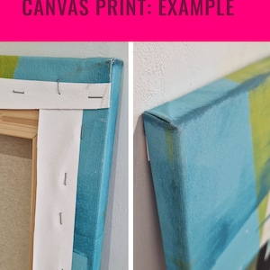 May include: Close-up of the side of a canvas print. The canvas is wrapped around the wooden frame and secured with staples. The print features a blue and green abstract design.