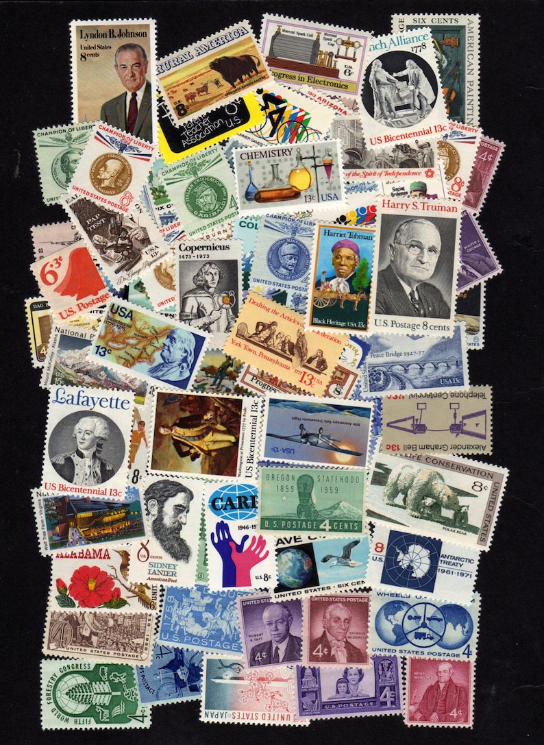 May include: A collection of vintage postage stamps featuring historical figures, scientific illustrations, and commemorative designs. The stamps showcase a variety of colors and themes, including portraits of U.S. presidents, scientific advancements, and historical events. The stamps are of various sizes and denominations.