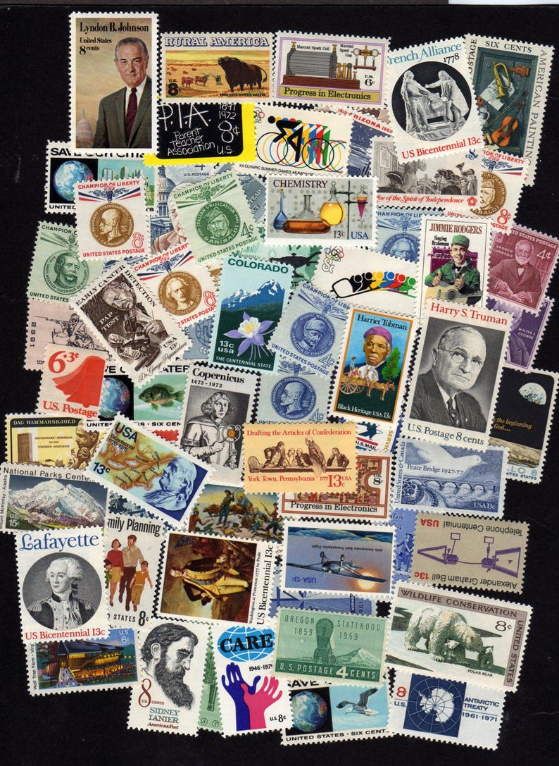 May include: A collection of vintage postage stamps featuring portraits of historical figures, scenes of American life, and commemorative designs. Stamps include Lyndon B. Johnson, Harriet Tubman, and the US Bicentennial.
