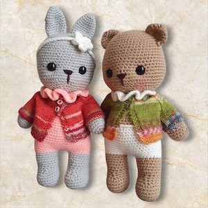 Crocheted teddy bear and cuddly rabbit with knitted vests.