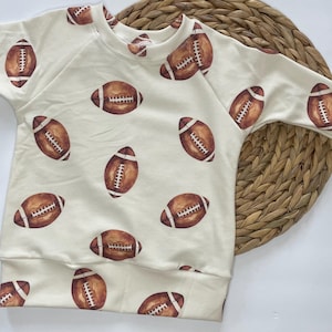 Football baby and toddler raglan/toddler football sweater/baby football clothes/organic baby clothes/football raglan/made in USA