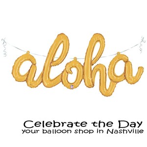 May include: Gold foil balloon spelling "aloha" in a cursive font, strung on a silver ribbon. The text "Celebrate the Day" and "your balloon shop in Nashville" are below the balloon.