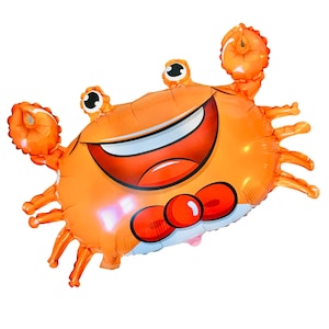 May include: Orange and red foil balloon shaped like a smiling crab wearing a red bow tie.