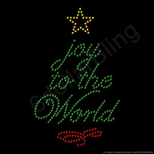 May include: A Christmas tree design made of green, red, and yellow rhinestones on a black background. The tree shape is formed by the words "Joy to the World". A yellow star tops the tree, and red rhinestones form the base.