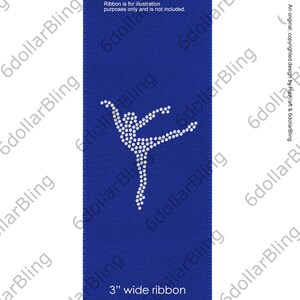 May include: A 3-inch wide blue ribbon featuring a rhinestone design of a ballerina in a dancing pose. The text "Ribbon is for illustration purposes only and is not included" is at the top. The ribbon is a copyrighted design.