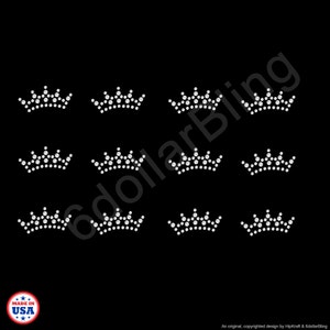 May include: A collection of rhinestone crown designs in various sizes, arranged on a black background. The crowns are made of small, sparkling white rhinestones. The image includes the text "6dollarBling" and "MADE IN USA".