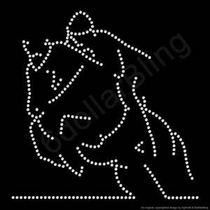May include: A white rhinestone design of a horse and rider on a black background. The design is made up of small, evenly spaced rhinestones, creating a sparkling effect. The horse is depicted mid-jump, with the rider in a riding position.