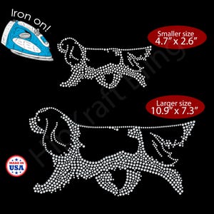 May include: Two rhinestone dog iron-on appliques in different sizes. The smaller size is 4.7" x 2.6", and the larger size is 10.9" x 7.3". The appliques are made in the USA and the text "Iron on!" is visible.