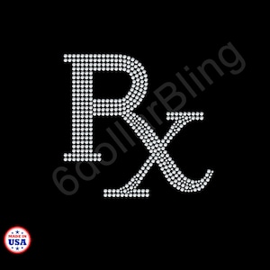 May include: A prescription symbol, Rx, made of sparkling rhinestones, is centered on a black background. The text "6DollarBling" is partially visible in the background. A "Made in USA" sticker is in the lower left corner.