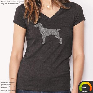 May include: Dark gray V-neck t-shirt featuring a rhinestone dog design. The dog is a silhouette made of small, sparkling rhinestones. The shirt is a solid color and has short sleeves. The text "Shirt is for illustration purposes only and is not included" is at the top.