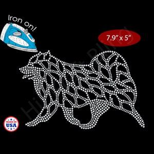 May include: A rhinestone dog design, 7.9" x 5", on a black background. The dog is made of many small, clear rhinestones. A blue iron is in the upper left corner with the words "Iron on!". A "Made in USA" sticker is in the lower left corner.