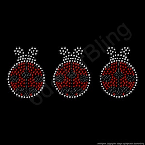 May include: Three ladybug-shaped rhinestone designs on a black background. Each design features a red body with black spots, outlined in white rhinestones, and topped with white rhinestone antennae.