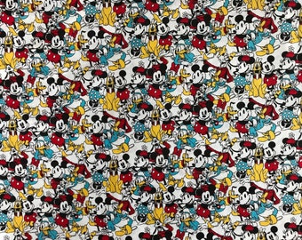 Vintage looking Mickey and Minnie Mouse, Donald Duck, Pluto, Goofy, and the whole Gang! Packed Cotton Fabric- Sold by the 1/2 Yard