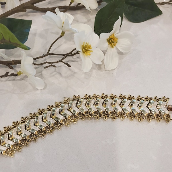 Judy Lee Bracelet in Gold tones with Silver accent. Signed on clasp. A little over an inch wide and 7 1/4" long Excellent condition, wearble