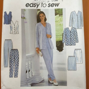 May include: A sewing pattern featuring a woman in a light blue suit with a floral pattern. The pattern includes illustrations of a vest, pants, a jacket, and a skirt. The text "easy to sew" is at the top.