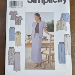 May include: Simplicity sewing pattern featuring a woman's suit with a jacket, skirt, and pants. The pattern includes various styles and sizes, with a color palette of light blue, beige, and floral prints.
