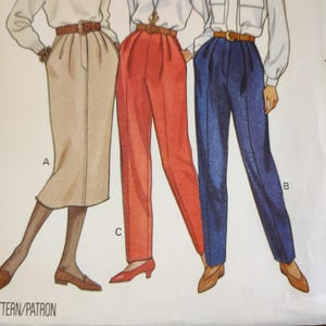 May include: Illustration of three different outfits: a beige skirt, red pants, and blue pants. Each outfit includes a white blouse, a brown belt, and matching shoes. The outfits are labeled A, B, and C.