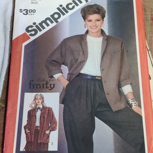 May include: Simplicity sewing pattern number 5640 for a brown blazer and black pants. The pattern is for size 10 miss and costs $3.00. The pattern is for a Ricky for Finitty design.