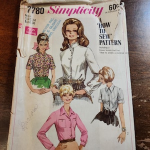 May include: Vintage Simplicity sewing pattern envelope. The envelope features illustrations of women's blouses and shirts. The text on the envelope includes "How to Sew Pattern" and "Size 14 Bust 36". The envelope is slightly torn.