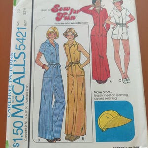May include: Vintage McCall's sewing pattern, size 10, featuring illustrations of jumpsuits and a hat. The pattern includes the text "Sew for Fun" and "Carefree Patterns". The cover shows a blue and white striped jumpsuit, a yellow jumpsuit, a red jumpsuit, and a white romper.