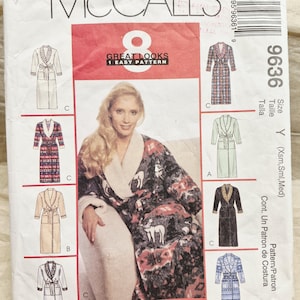 May include: A McCall's 9636 sewing pattern envelope for a robe in sizes Xsm, Sml, and Med. The front features illustrations of eight robe variations with different patterns and colors, including solid, plaid, and animal print designs.