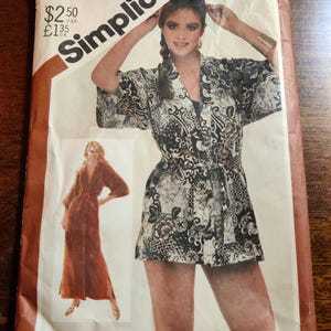 May include: Simplicity sewing pattern number 5545 for a Jiffy wrap dress. The pattern is for sizes 14-16 and costs $2.50 USD and £1.35 UK.
