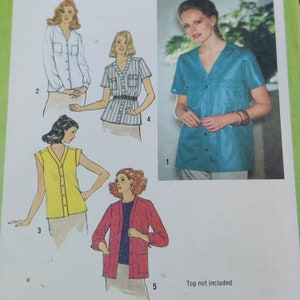 May include: A sewing pattern sheet featuring illustrations of various women's tops. Designs include a button-down shirt, a striped top with a belt, a yellow sleeveless vest, and a red jacket. The image also shows a woman wearing a teal button-down shirt.