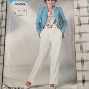 May include: A vintage sewing pattern for a pair of white trousers and a light blue blazer. The pattern number is 7570 and the sizes are 10-12-14 and 38-40-42.
