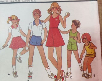 McCall's 6082 Kid's Summer Knit Shorts T-Shirt Tank Top Polo Tennis Skirt Vintage Children's Fashion Sewing Pattern 1970s 70s Size 7 UNCUT