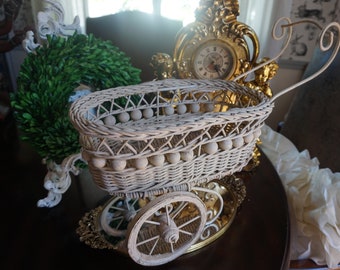 white wicker doll carriage