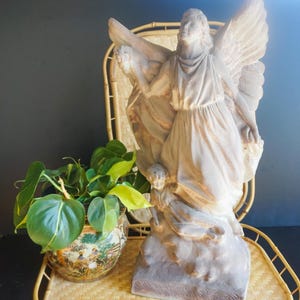 angel statue garden concrete