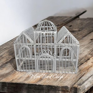 metal bird cage with hinged top, decorative