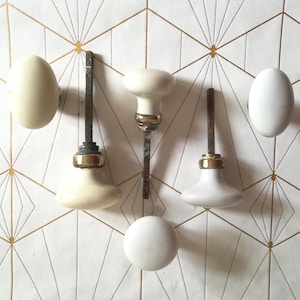 Coppie di maniglie antiche in porcellana, Francia.