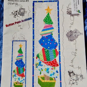 May include: A colorful patchwork quilt pattern for a funky tree, measuring 6 inches by 22 inches. The pattern is titled "Funky Tree" and is part of the "Monthly Mini's series #3" from Patch Abilities, Inc.