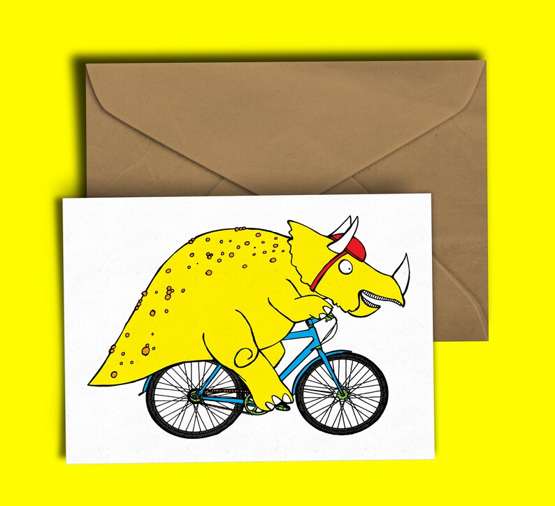 Triceratops Riding A Bike Cycling Tour De Yorkshire Bike Birthday Celebration Humour Card A6 300GSM. image 1