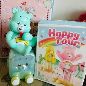 Happy Tour Wish Baby Carebear Care Bear niebiesko-zielony z bagażem figurka lalki - w zestawie pudełko