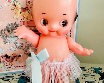 Kitsch Vintage plastic Kewpie Posable Baby doll with sweet tutu dress figurine - Made in Hong Kong
