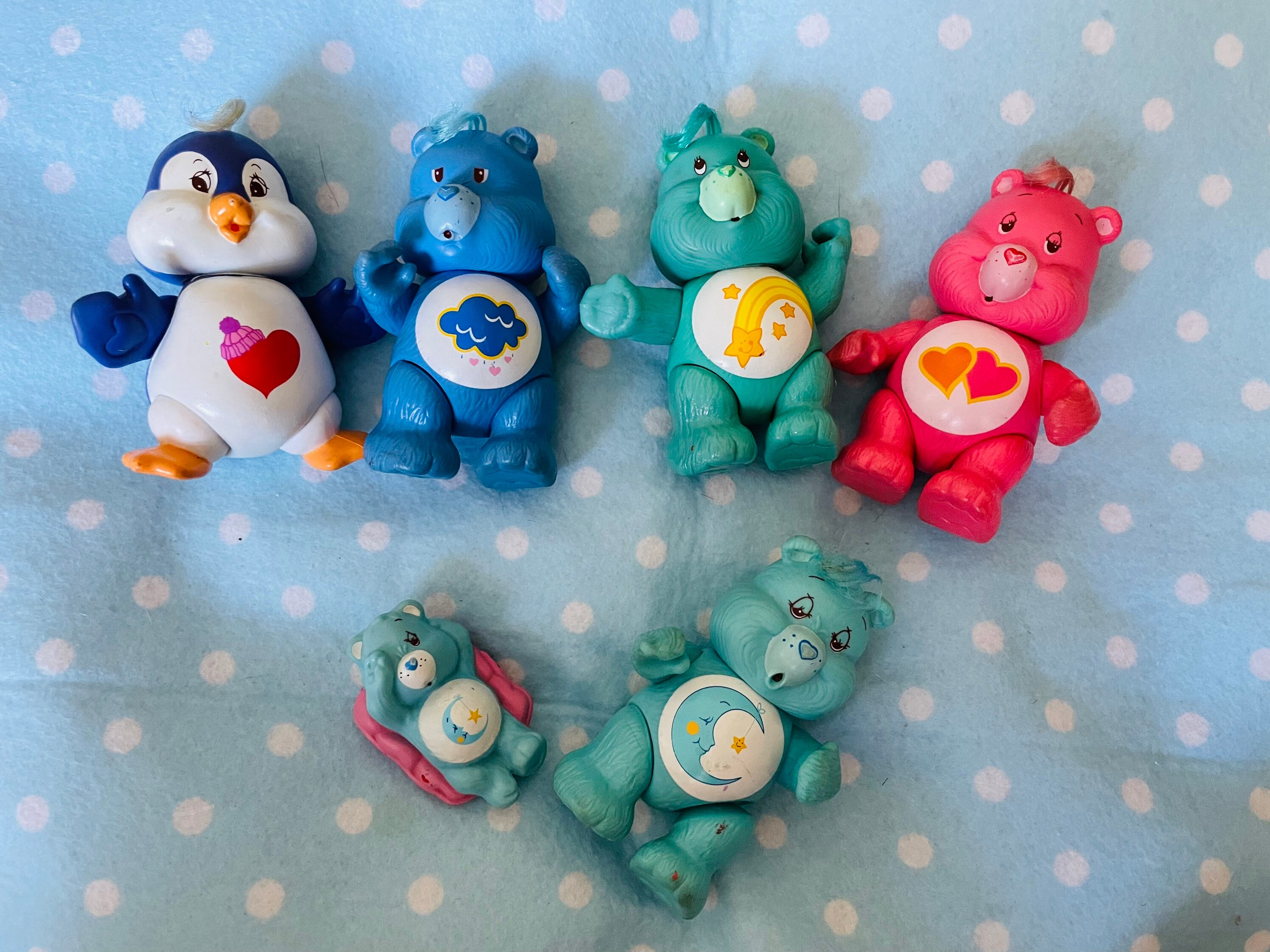 small plastic care bears