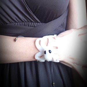 Phosphorescent white octopus bracelet during the day, blue at night, octopus cuff, kraken cthulu, octopus