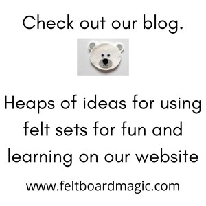 May include: White felt polar bear head with black nose and blue eyes. Text reads: "Check out our blog. Heaps of ideas for using felt sets for fun and learning on our website www.feltboardmagic.com"