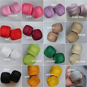 May include: A collection of yarn balls in various colors, including mint blue, sky blue, turquoise, cold pink, pink, wine, red, lilac, sapphire blue, dusty lilac, cocoa, beige, white, light green, emerald, black, peach, light beige, light gray, yellow, and yolk.