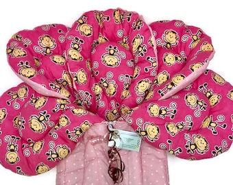 Pink outside with flannel monkeys inside stroller liner