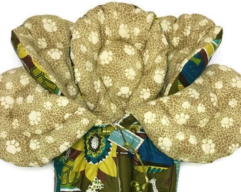 African print outside with flannel paw print stroller liner