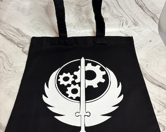 Bolsa de algodón reutilizable negra de la Hermandad del Acero