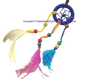 May include: A dreamcatcher keyring with a blue hoop, a woven web, and colourful feathers. The keyring features yellow, orange, and blue feathers, along with wooden beads in various colours. The design includes a silver key ring.