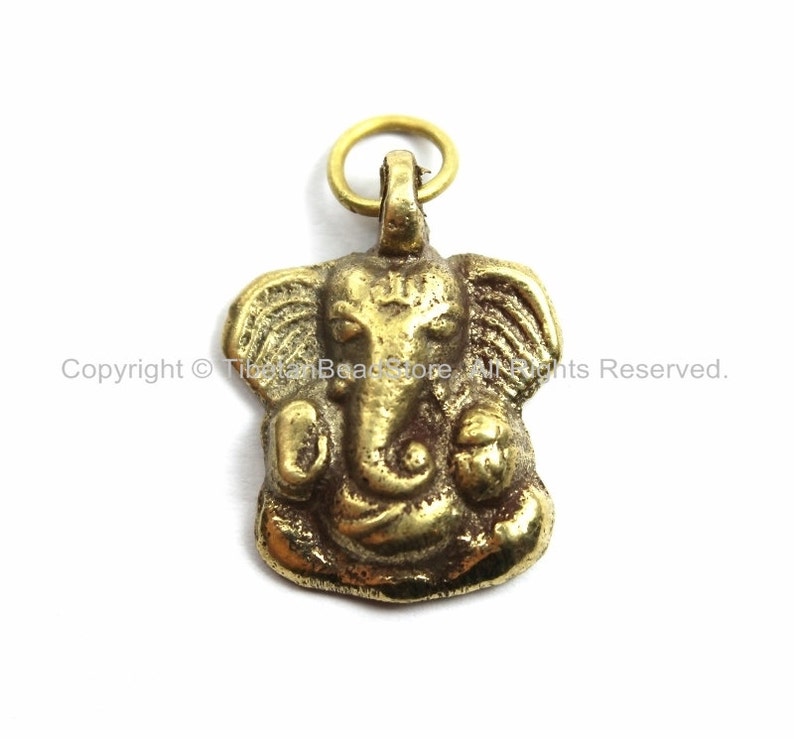 Small Nepalese Tibetan Brass Ganesh Charm Pendant Brass Charms Yoga Charm Pendant WM5759 Ganesh Charm Design \u00a9 TibetanBeadStore\u00ae