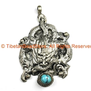 Ethnic Tribal Antique Look Repousse Tibetan Dragon Pendant with Turquoise Inlay - TibetanBeadStore - Handmade - Unisex Jewelry - WM7208