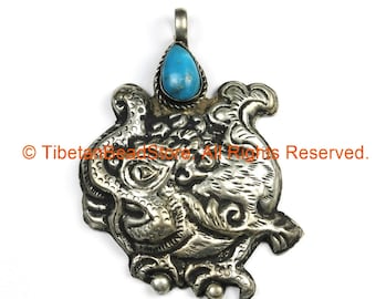 Ethnic Tribal Nepal Antique Look Repousse Tibetan Silver Guardian Deity Pendant with Turquoise Inlay - Nepal Tibet Jewelry - WM7205