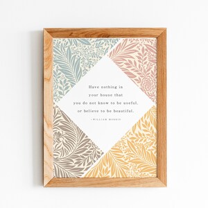 May include: A framed print with a quote by William Morris: "Have nothing in your house that you do not know to be useful, or believe to be beautiful." The print features a floral design in shades of blue, pink, brown, and yellow.