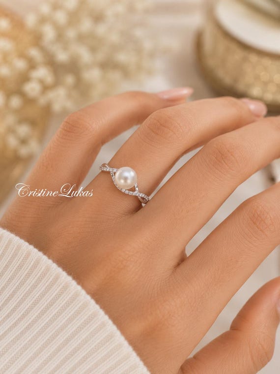 Natural Pearl Ring With Cubic Zirconia Stones, Braded Infinity in Sterling Silver.
